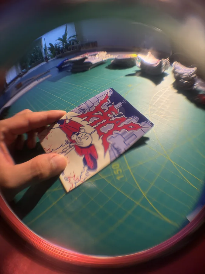 Holding the printed comic